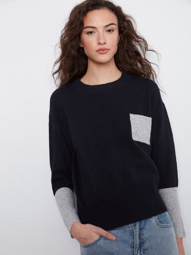 Heather grey sweater with long sleeves and red contrast details for a modern touch by Charlie B.
