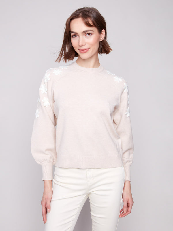Heather oat sweater with elegant crew neck and intricate floral embroidery on shoulders, adding charm by Charlie B.