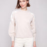 Heather oat sweater with elegant crew neck and intricate floral embroidery on shoulders, adding charm by Charlie B.