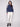 Elegant denim sweater featuring ribbed cuffs and hem, highlighted with delicate flower embroidery by Charlie B.