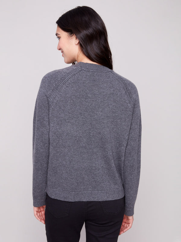 Enjoy the cozy feel of knit cuffs on this stylish charcoal sweater, designed for warmth and fashion by Charlie B.