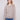 Light brown sweater with long sleeves and charming floral embroidery, perfect for a cozy autumn day by Charlie B.