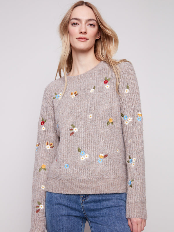 Chic heather sweater featuring delicate floral embroidery details, offering both comfort and style by Charlie B.