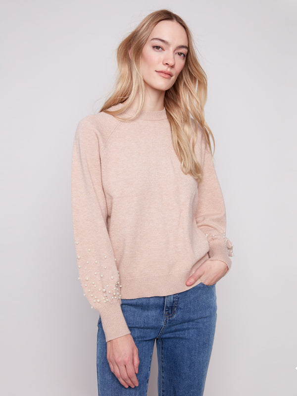 Elegant heather camel sweater featuring a classic crew neck design, perfect for any occasion by Charlie B.