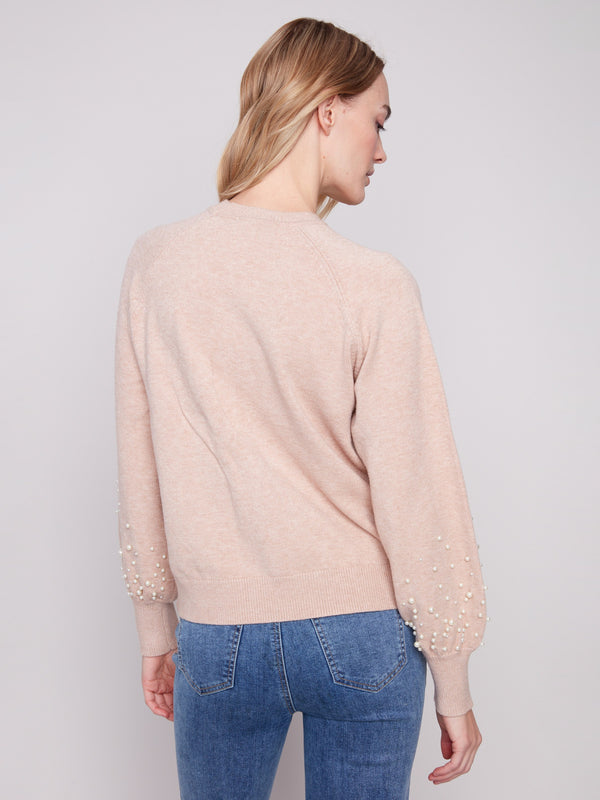 Chic camel sweater adorned with delicate pearl details, offering a refined and elegant look by Charlie B.