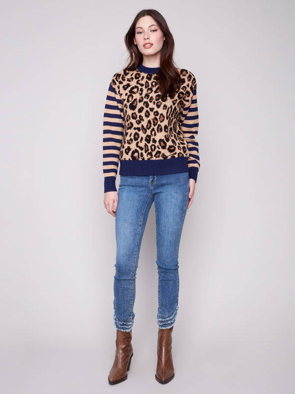 Stylish crew neck sweater with a striking leopard jacquard body and striped details by Charlie B.