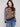 Elegant sweater with a leopard jacquard body, highlighted by its classic crew neck design by Charlie B.