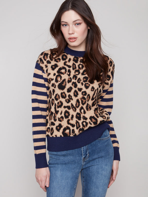 Elegant sweater with a leopard jacquard body, highlighted by its classic crew neck design by Charlie B.