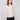 Heather oat sweater with a classic crew neckline and intricate embroidery detailing for an elegant touch by Charlie B.