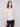 Heather oat sweater with a classic crew neckline and intricate embroidery detailing for an elegant touch by Charlie B.