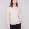 Heather oat sweater with a classic crew neckline and intricate embroidery detailing for an elegant touch by Charlie B.