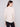 This sweater features tonal embroidery with a refined drop shoulder design, offering both comfort and style by Charlie B.