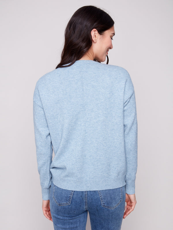Elegant drop shoulder design on this heather oxford sweater, crafted with attention to detail and style by Charlie B.