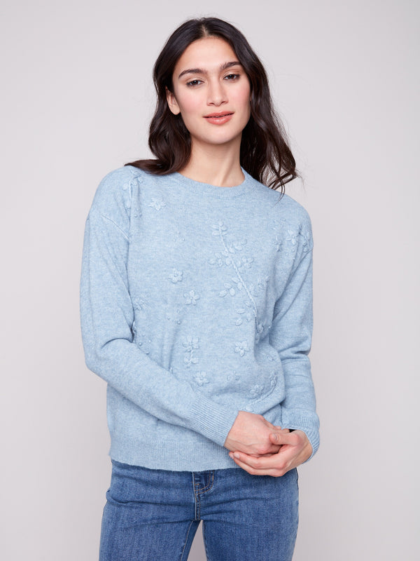 Chic heather oxford sweater combining crew neck design with delicate embroidery for timeless fashion appeal by Charlie B.