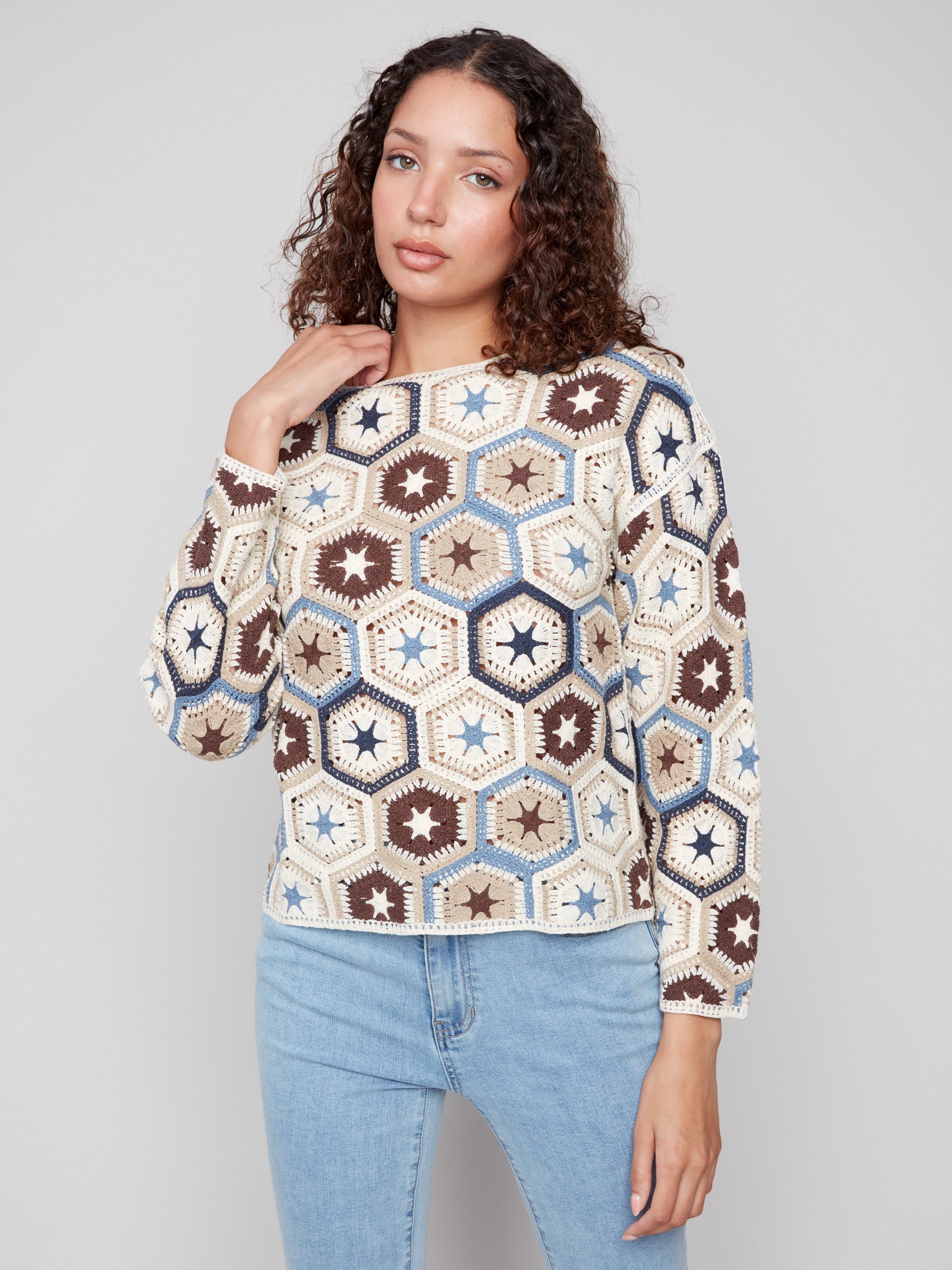 Elegant crochet top with a boatneck and intricate hexagonal patterns for a unique look by Charlie B.