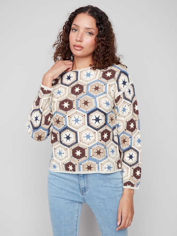 Elegant crochet top with a boatneck and intricate hexagonal patterns for a unique look by Charlie B.