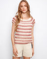 The top features a stylish boat neckline with pink-toned stripes for a chic look by Charlie B.