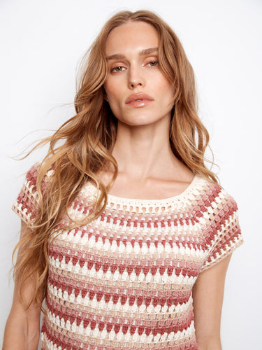 Pink-toned stripes create a vibrant and trendy appearance in this fashionable piece by Charlie B.