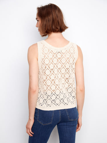 Stylish sleeveless crochet vest in natural tone, perfect for warm weather layering by Charlie B.