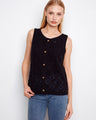 This sleeveless top features a classic crew neckline, perfect for layering or wearing alone. Designed by Charlie B.