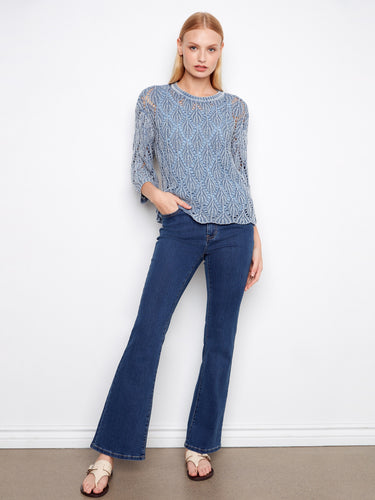 Chic blue haze crochet sweater made of 100% cotton with an elegant crew neck design by Charlie B.
