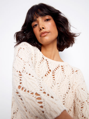 Experience the soft texture of this relaxed fit top, crafted from a breathable cotton blend. By Charlie B.