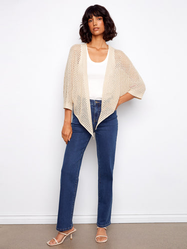 Elegant beige fishnet sweater with adjustable tie-front design, ideal for versatile styling by Charlie B.