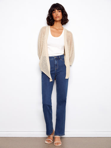 Chic crochet shrug showcasing elbow dolman sleeves and a hint of shimmer in the fabric by Charlie B.