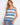 This top features a scoop neckline with intricate patterns in blue and white hues, perfect for casual outings. By Charlie B.