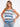 This A-line fit top offers a relaxed silhouette in soothing blue shades, making it a versatile wardrobe staple. By Charlie B.