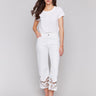 White cropped jeans with a classic five-pocket design by Charlie B.