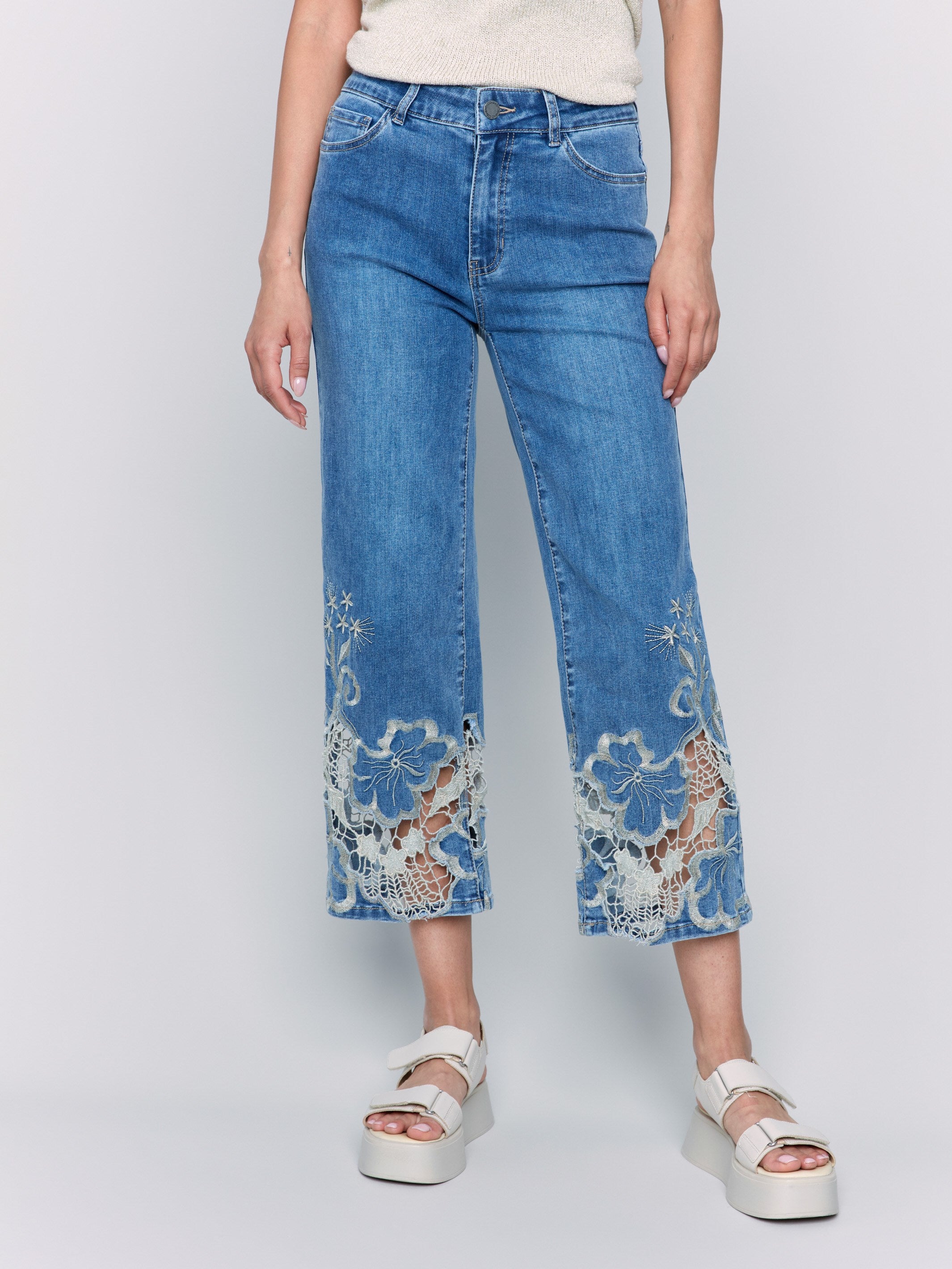 Jeans in cropped length with intricate detailing, perfect for casual wear by Charlie B.