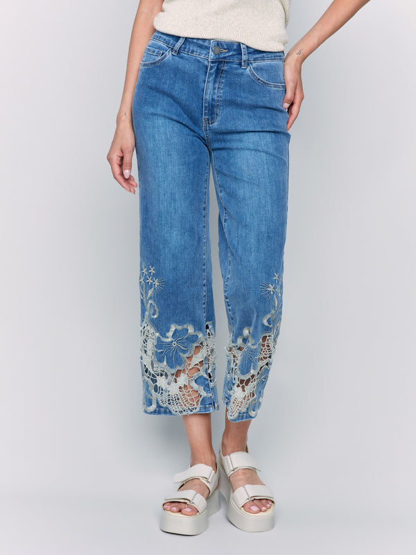 Flare leg jeans with unique laser cut lace accents for added flair by Charlie B.