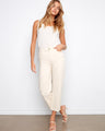 Natural-colored cropped jeans with a comfortable barrel leg and stretch twill fabric, offering style and ease by Charlie B.
