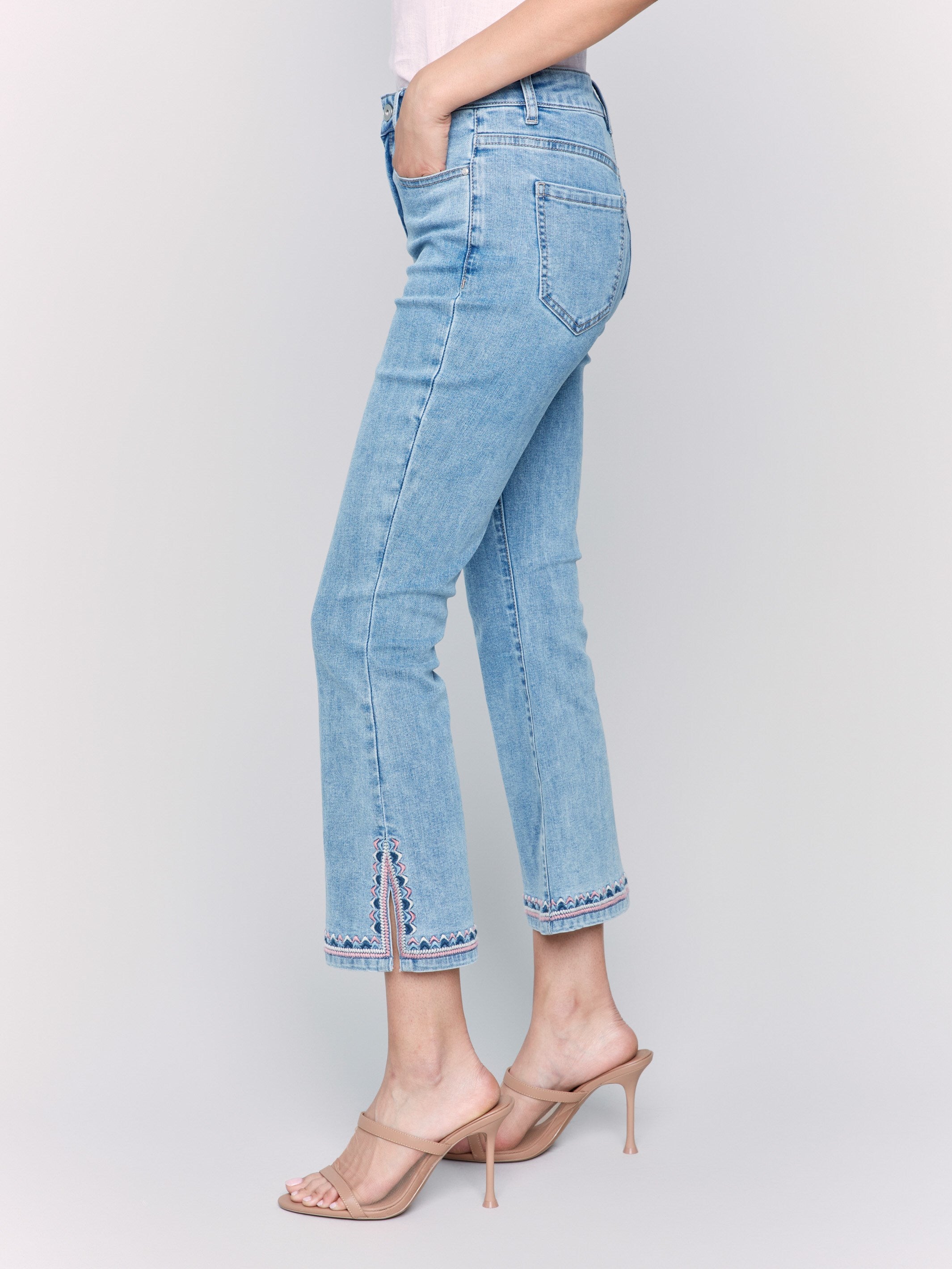 Jeans featuring embroidered details at the hem by Charlie B.