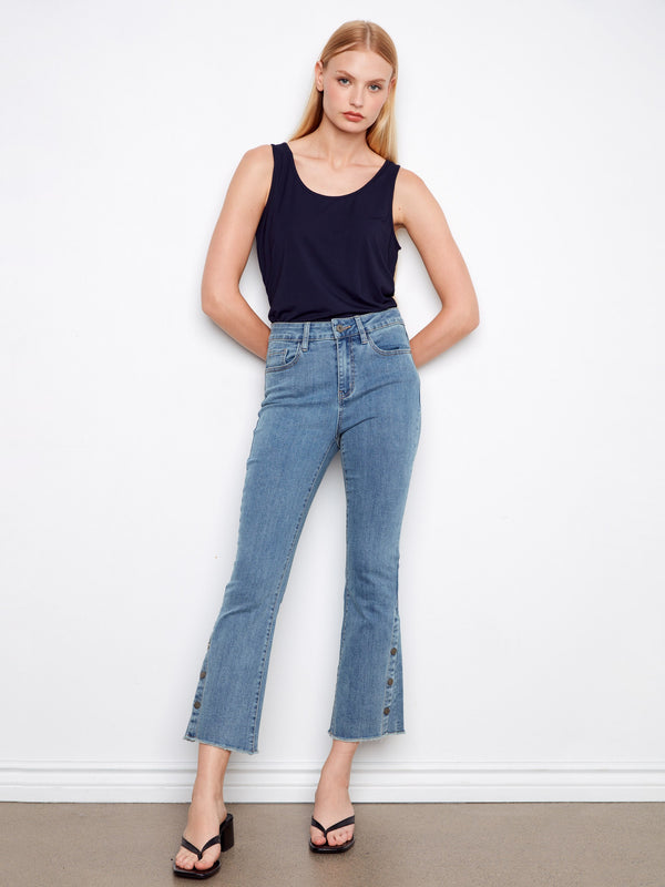 Blue cropped jeans with a flattering bootcut fit and side snaps, offering a stylish and modern look by Charlie B.
