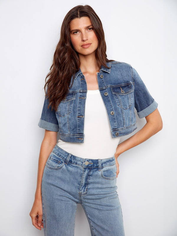 Medium blue denim jacket with a chic button closure and short, rolled sleeves for a trendy look by Charlie B.