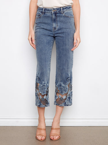 These cropped length denim jeans showcase a unique lace hem and are designed for both comfort and style. By Charlie B.