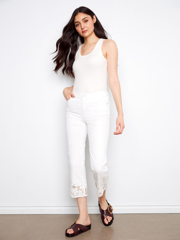 These cropped length pants offer a modern twist on classic style, ideal for showcasing your favorite footwear. By Charlie B.