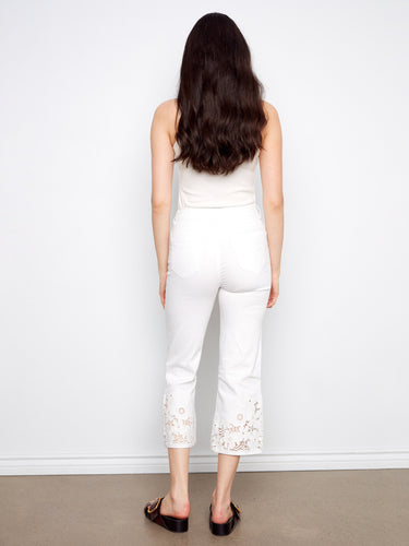 These stylish cropped pants showcase intricate lace details at the hemline for added flair. By Charlie B.