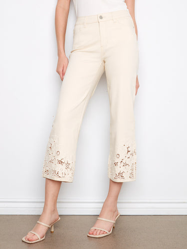 Flared fit cropped jeans with exquisite laser cut detailing on the hem, offering both elegance and comfort by Charlie B.
