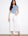 These pants feature a stylish flared leg design, perfect for adding a touch of flair to any outfit. By Charlie B.