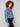A button-front closure adds a classic touch to this blue denim jacket with floral detailing by Charlie B.