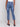 Medium blue jeans featuring a straight fit and asymmetrical hem detail by Charlie B.