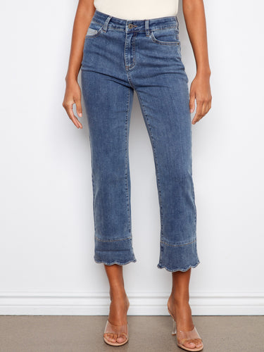 Medium blue jeans designed with five pockets and contrast scallop cuffs, offering both function and fashion by Charlie B.