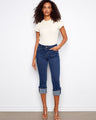 Denim jeans with a slim fit and cropped length, featuring a stylish five-pocket design. Perfect for casual outings. By Charlie B.