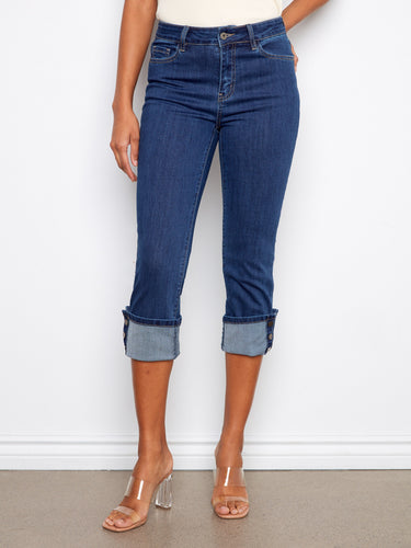 These jeans offer a regular rise and stretch denim for comfort, complete with snap button detail on the cuff. By Charlie B.