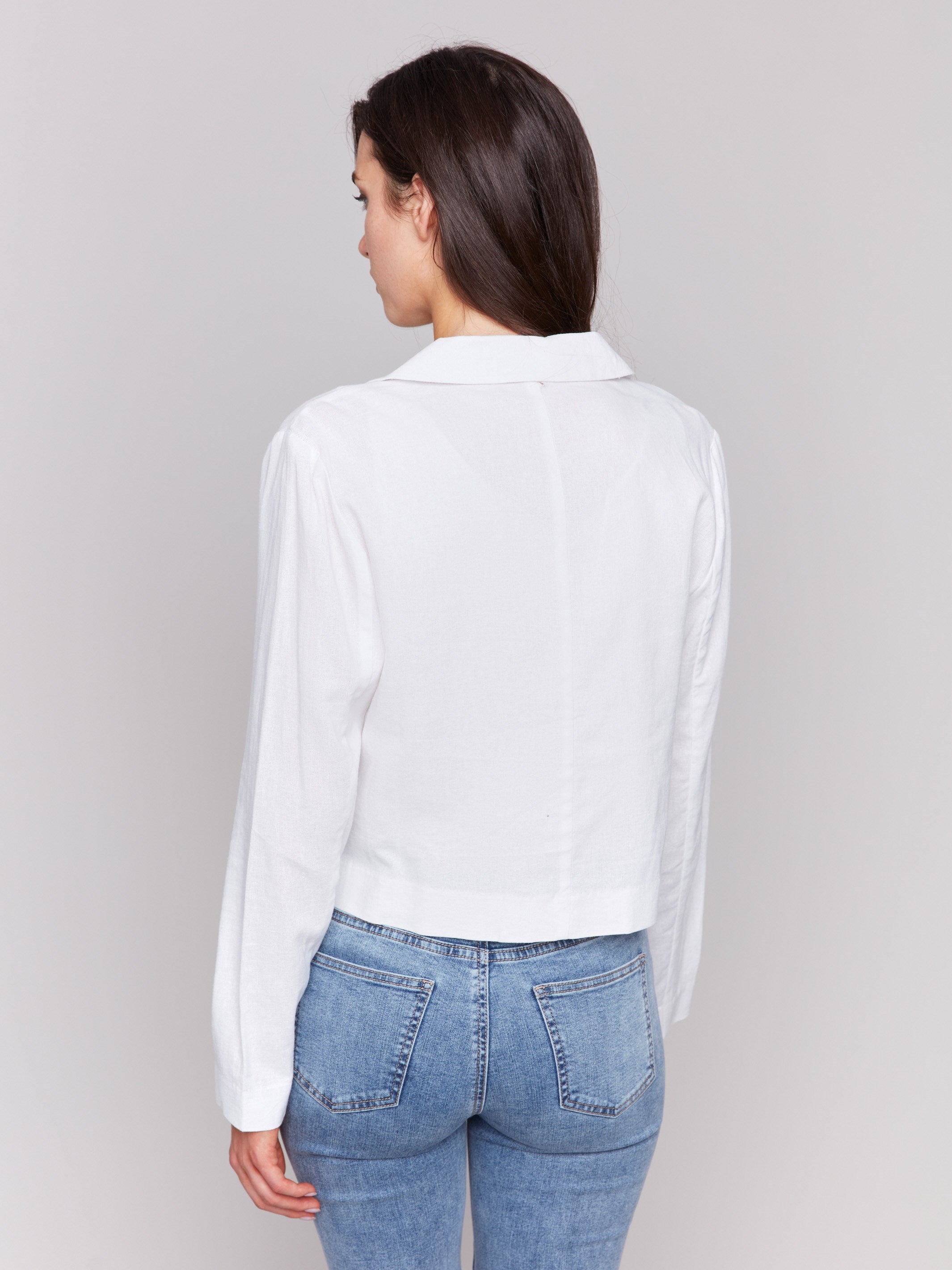 Elegant white blazer crafted from linen blend by Charlie B.