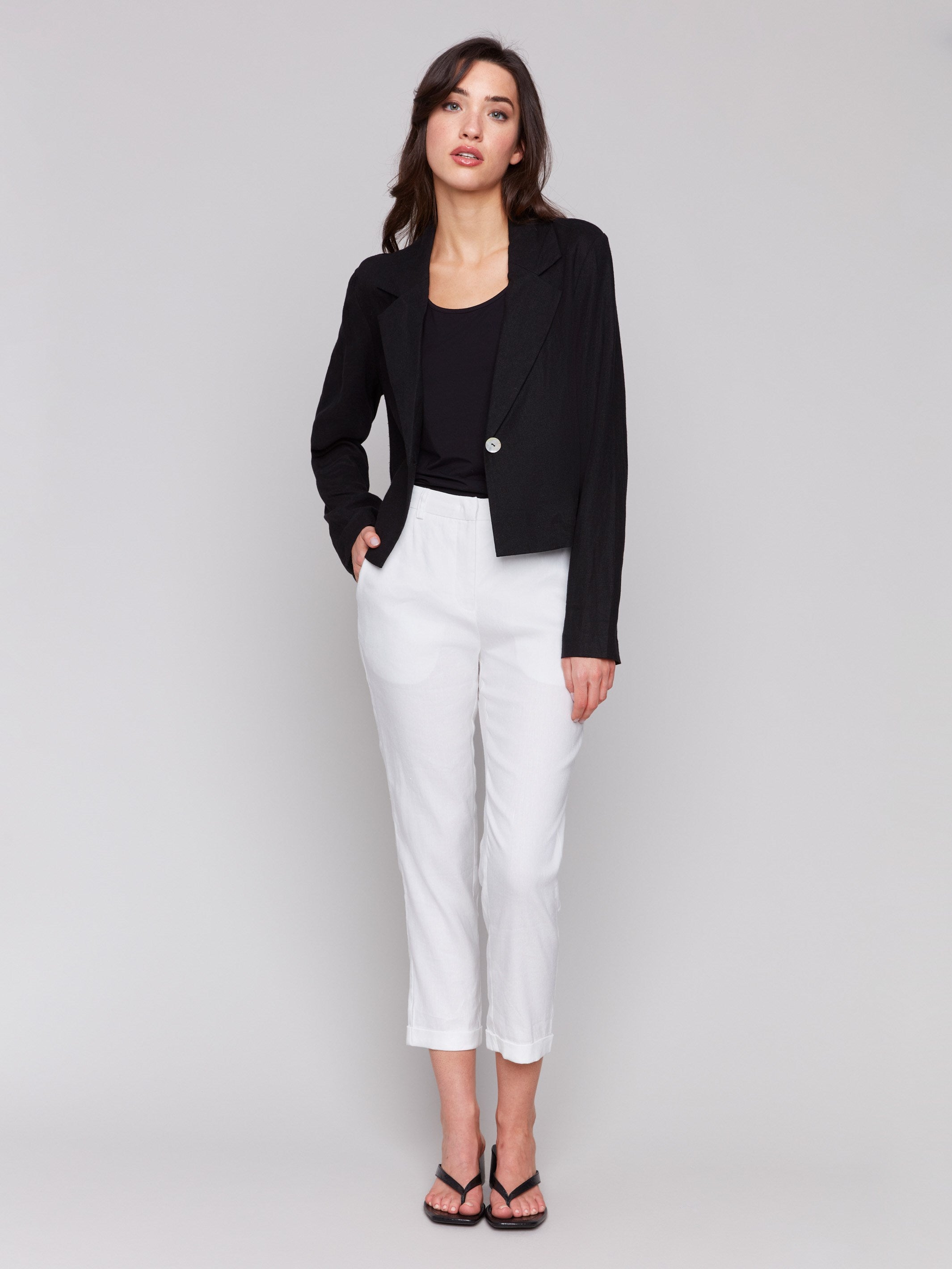 Stylish cropped blazer featuring single button closure by Charlie B.