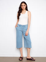 These jeans feature a wide leg fit, offering both comfort and style. Perfect for a casual day out. By Charlie B.